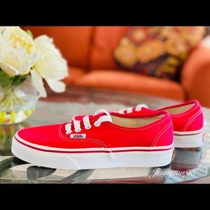 Vans Authentic lace-up red deck shoes.
